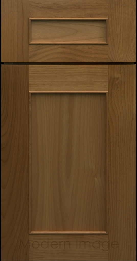 Detail view of a Chandler Shaker cabinet door in Perfect Brown stain with raised molding along the inner panel.